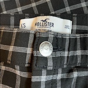 Hollister ultra high rise black and white pants.